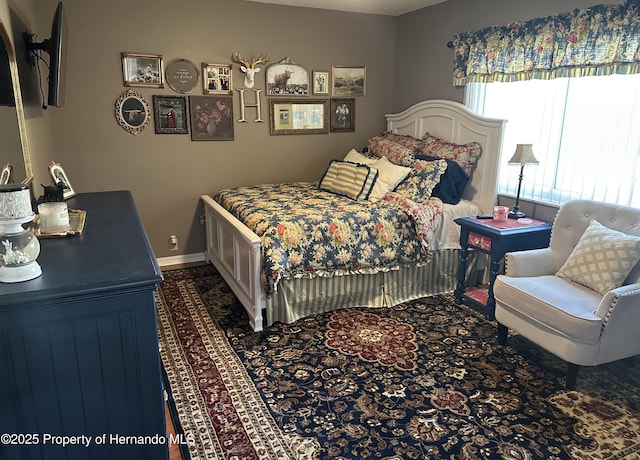 bedroom with baseboards