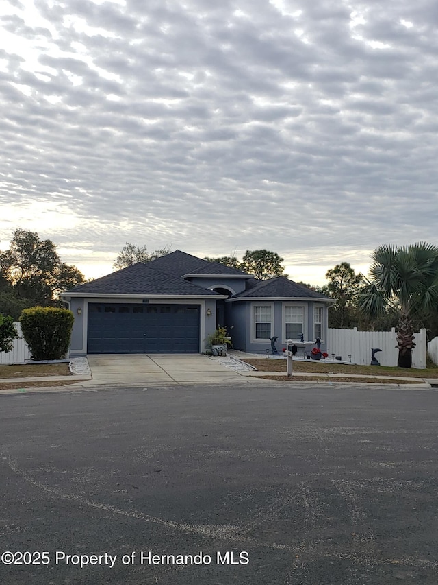 view of front of home featuring a garage