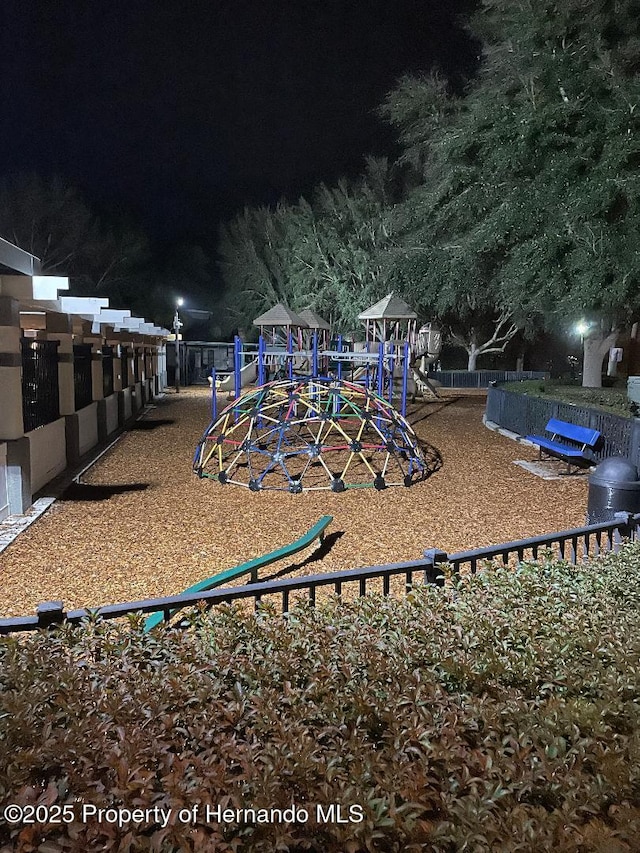 view of playground at twilight