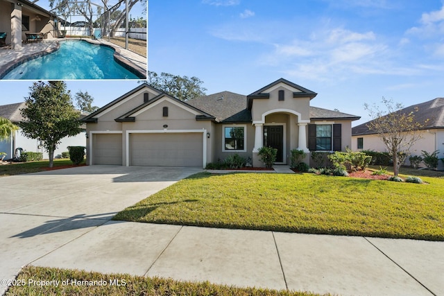 view of front of house with stucco siding, an attached garage, a front yard, an outdoor pool, and driveway