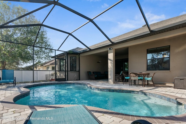 pool featuring a patio area