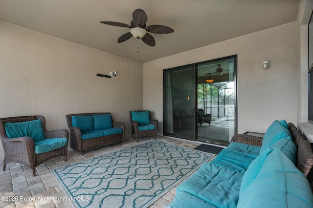 view of patio featuring a ceiling fan and outdoor lounge area