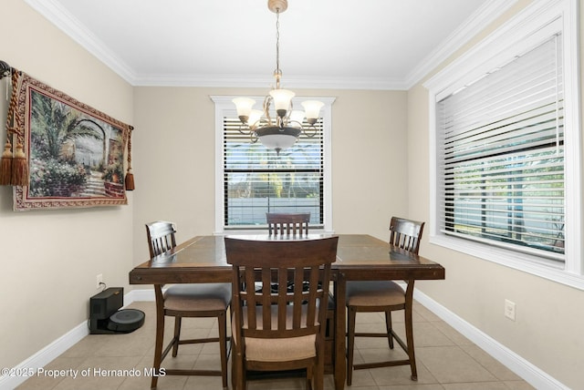 dining area with a wealth of natural light, a notable chandelier, baseboards, and light tile patterned floors