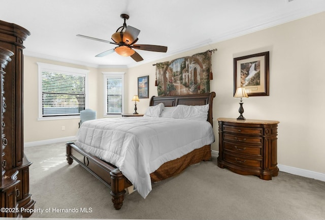 bedroom featuring a ceiling fan, light colored carpet, crown molding, and baseboards