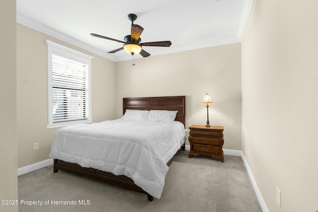 bedroom featuring ornamental molding, carpet, and baseboards