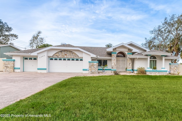 ranch-style house with a garage and a front yard