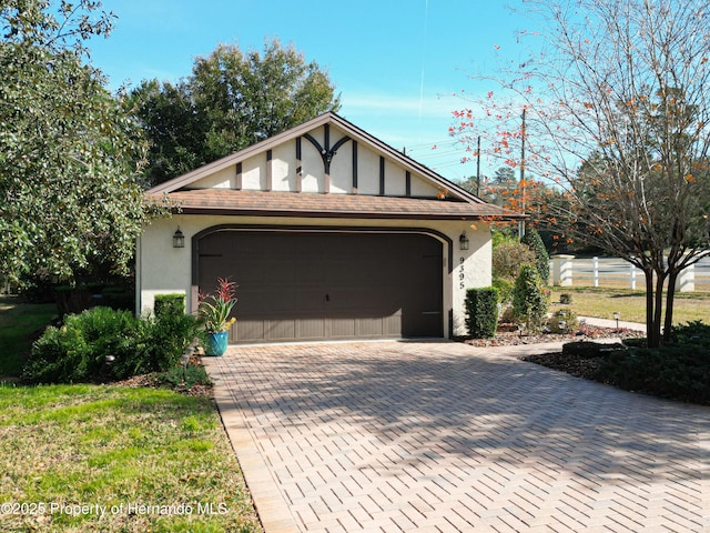 exterior space featuring an outbuilding and a garage