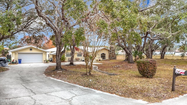 single story home with a garage