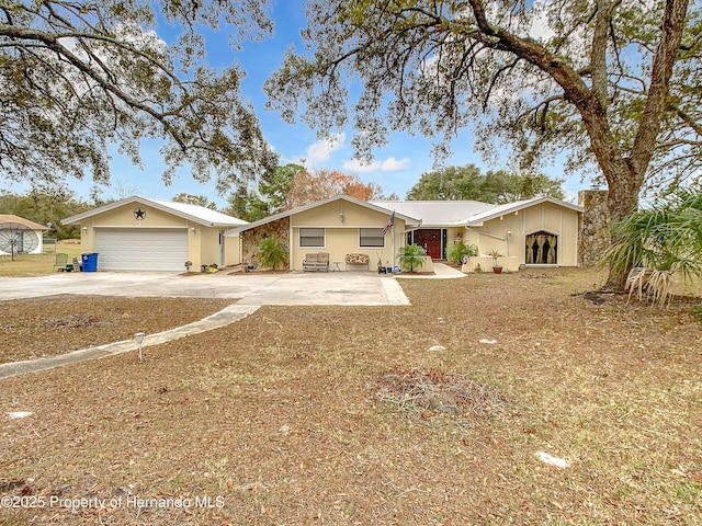 single story home featuring a garage