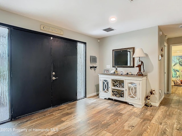 entrance foyer featuring light wood-type flooring