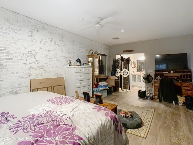 bedroom featuring ceiling fan and light wood-type flooring