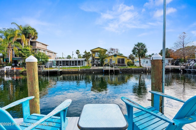 dock area featuring a water view