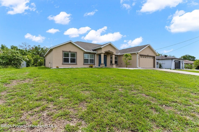 single story home with a garage and a front lawn