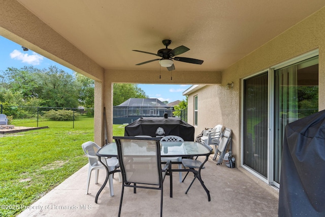 view of patio featuring ceiling fan and area for grilling