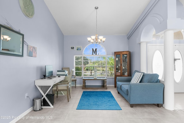 sitting room with light tile patterned floors and a notable chandelier