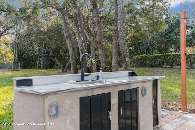 view of patio featuring sink