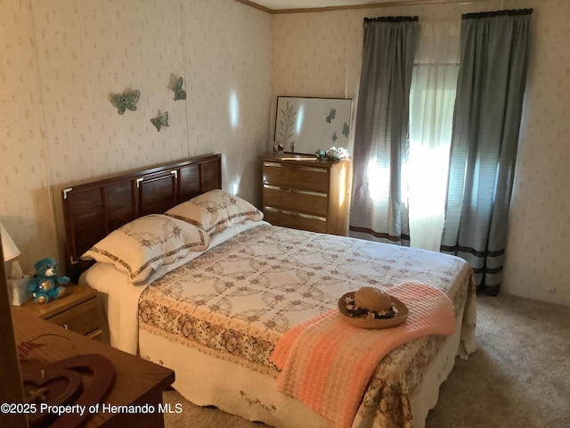 bedroom featuring carpet