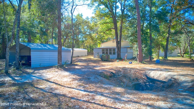 view of yard featuring a carport