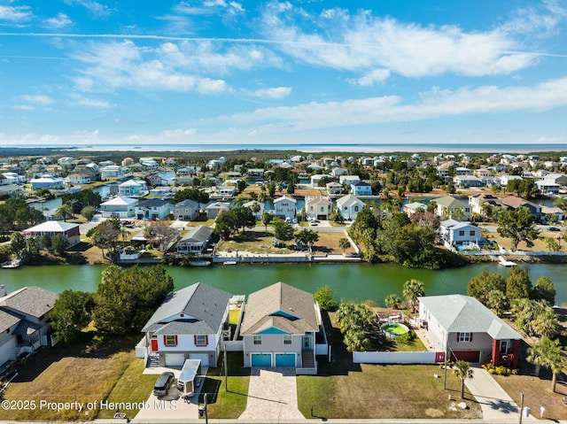 drone / aerial view with a water view