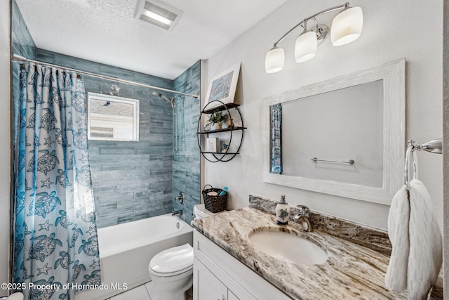 full bathroom with vanity, toilet, a textured ceiling, and shower / bath combo