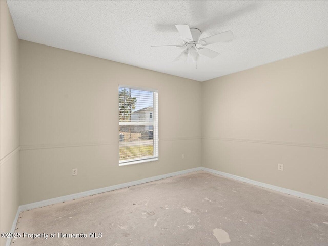 unfurnished room featuring a textured ceiling and ceiling fan