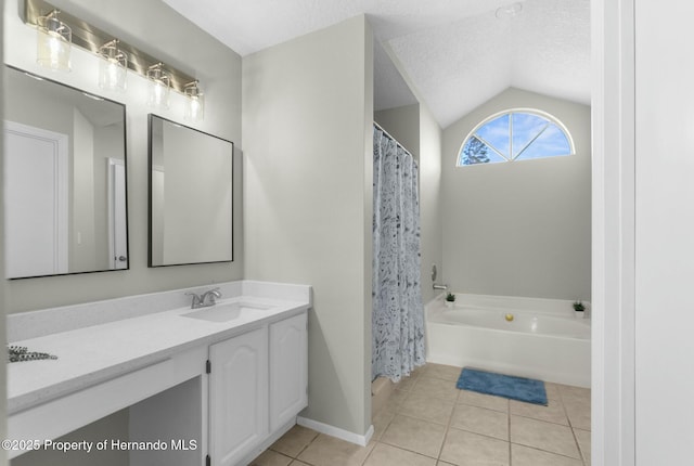 bathroom featuring plus walk in shower, a textured ceiling, tile patterned floors, vaulted ceiling, and vanity