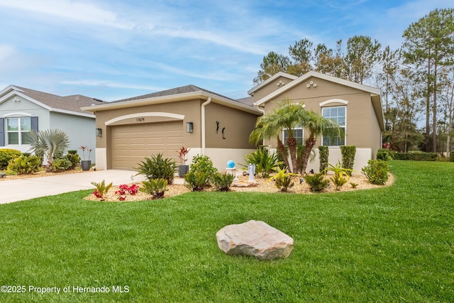 ranch-style home featuring a garage and a front yard