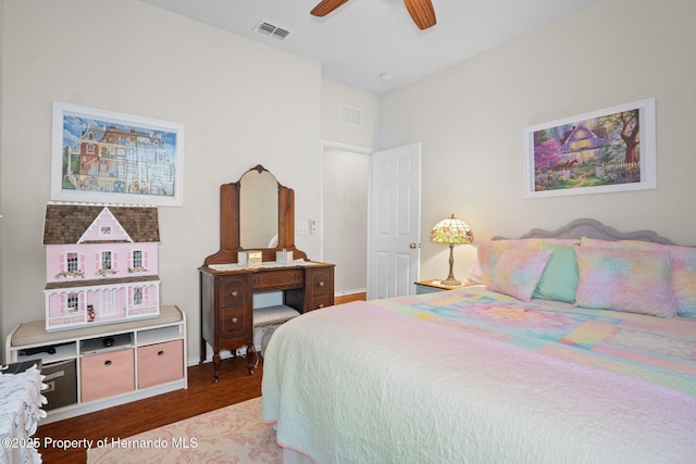 bedroom with ceiling fan and wood-type flooring