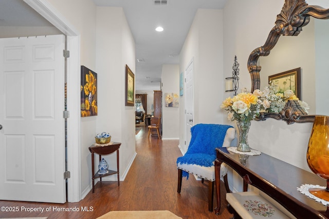 hall featuring dark wood-type flooring