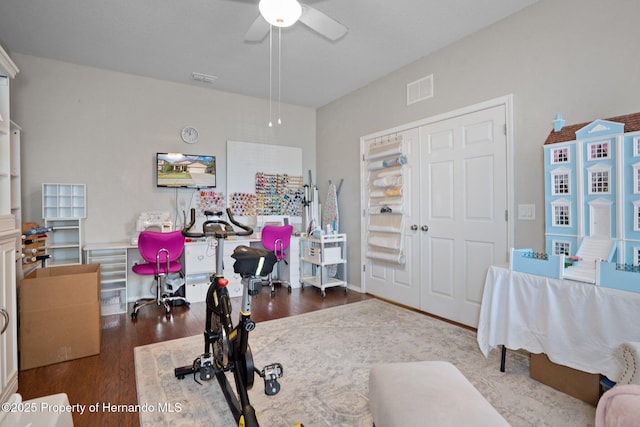 office with ceiling fan and wood-type flooring