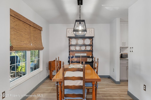 dining room featuring light hardwood / wood-style flooring