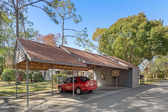 view of car parking featuring a carport