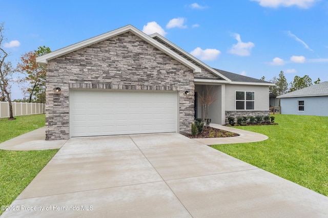 view of front of house featuring a garage and a front yard