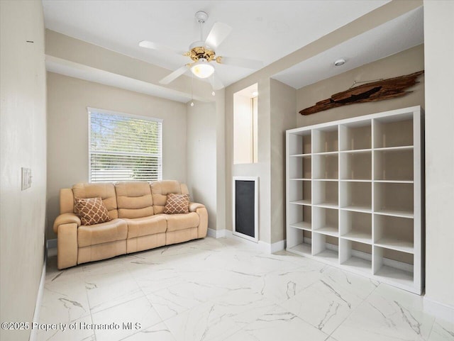 living room featuring ceiling fan