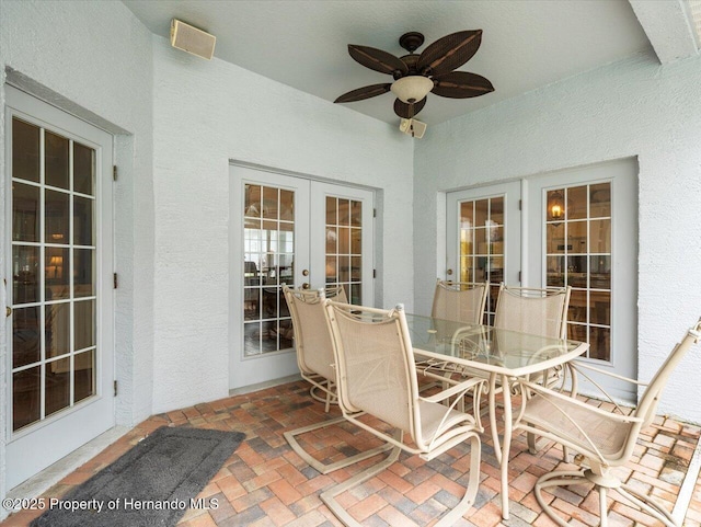 view of patio / terrace with french doors and ceiling fan