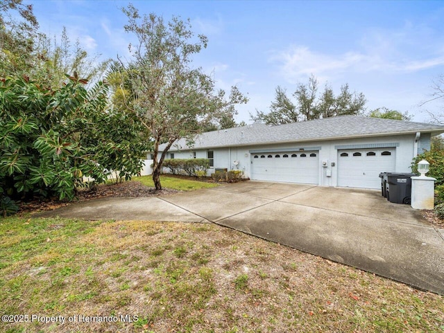 view of property exterior featuring a garage