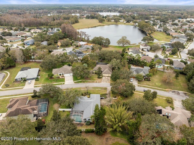 drone / aerial view with a water view