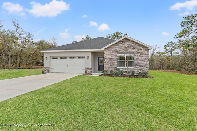 view of front facade with a garage and a front yard