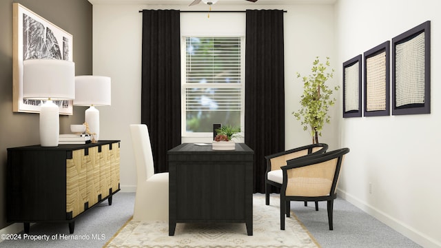 living area featuring ceiling fan and light carpet