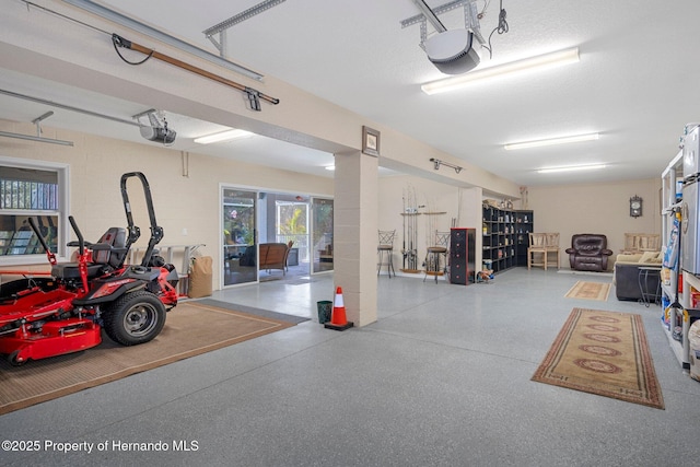 garage featuring a garage door opener