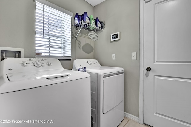 laundry area with washer and clothes dryer