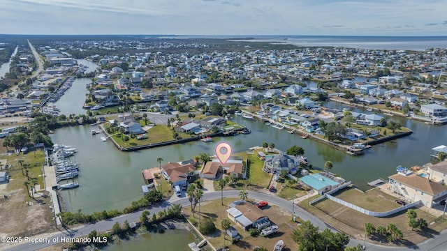 bird's eye view with a water view