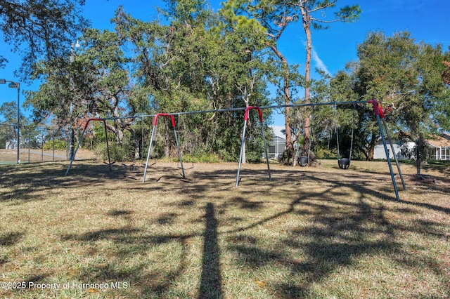 view of jungle gym featuring a yard