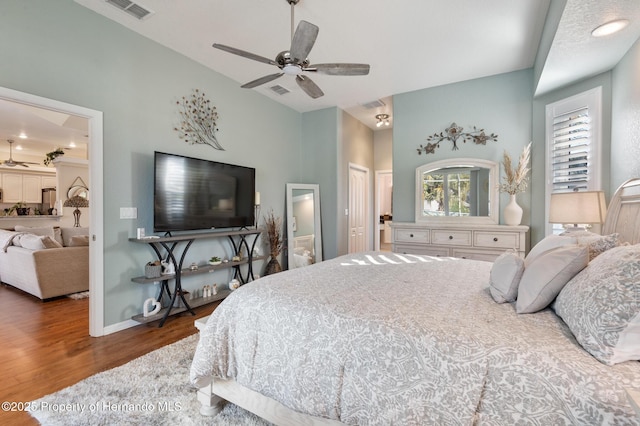 bedroom featuring dark wood-type flooring and ceiling fan