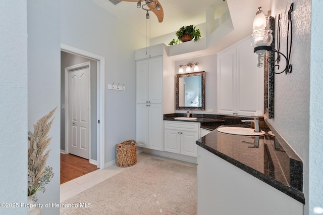 bathroom featuring tile patterned floors and vanity