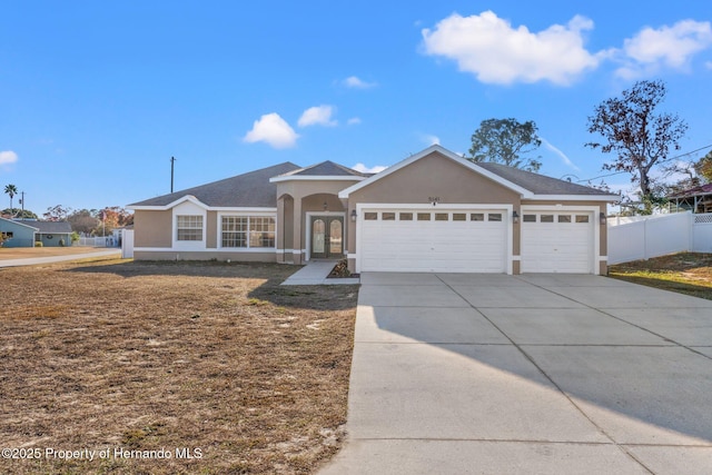 ranch-style house with a garage