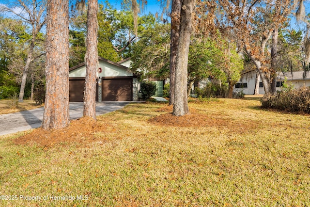 view of yard with a garage