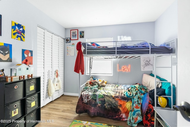 bedroom featuring light wood-type flooring