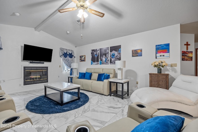 living room with ceiling fan, a textured ceiling, and vaulted ceiling with beams