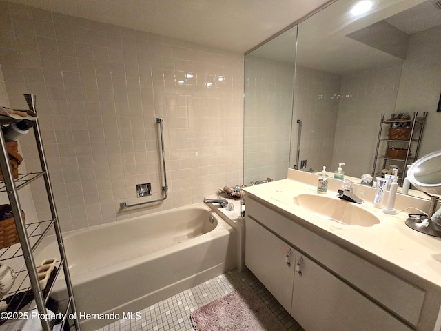 bathroom with vanity, shower / washtub combination, and tile patterned floors